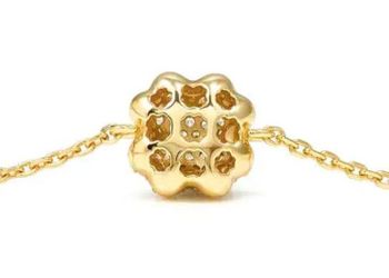 Bransoletka Nomination  LifePoetry z zakrzywioną czterolistną koniczyną (2).jpg